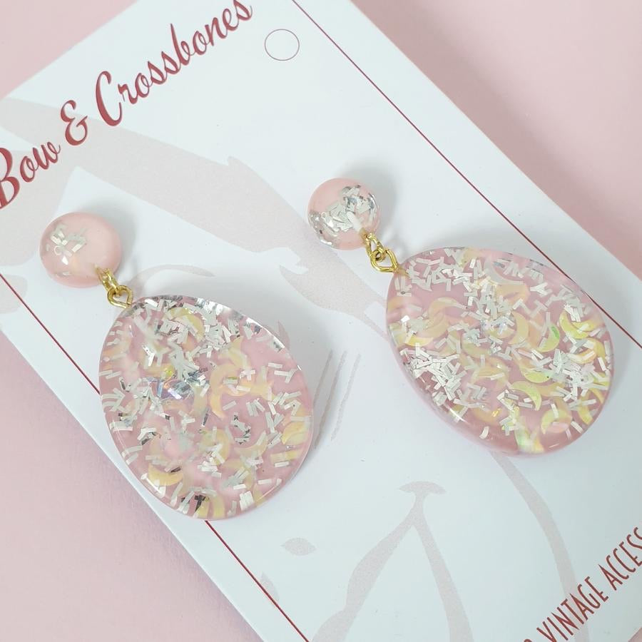 Bow and Crossbones Suzy Tear Drop Confetti Lucite Earrings- Pink