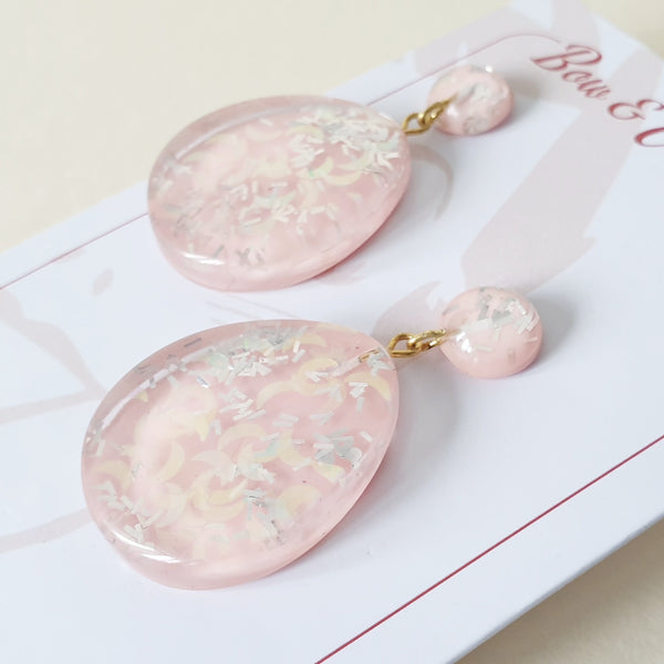 Bow and Crossbones Suzy Tear Drop Confetti Lucite Earrings- Pink